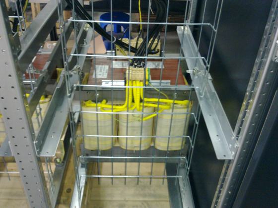 Two 63 kVA three-phase transformers in a cabinet